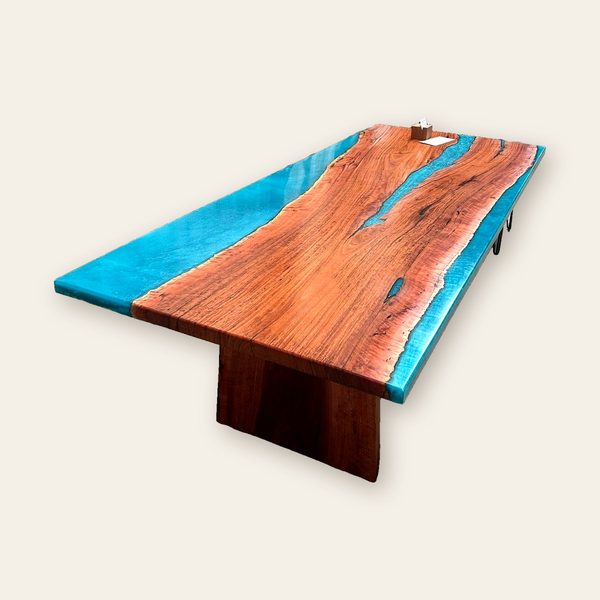 Red timber river table with a turquoise resin centre