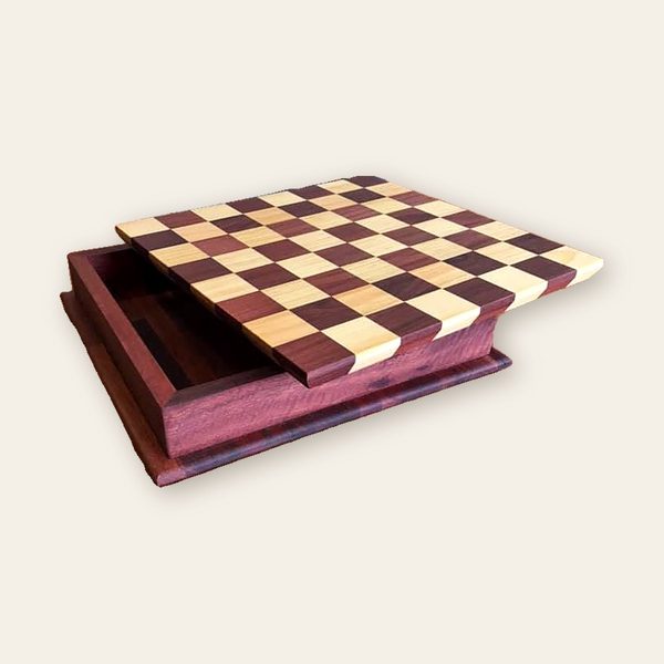 Two-tone timber chess box with the lid slid half open
