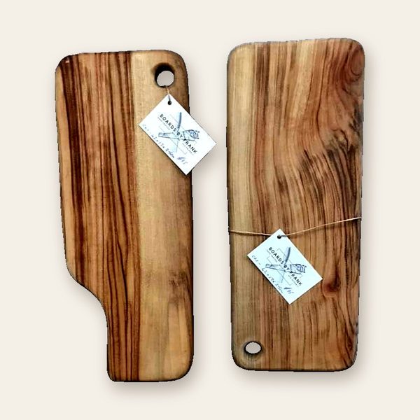 Pair of striped paddle boards with handles and hanging holes