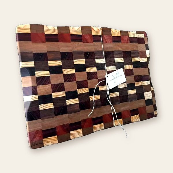 End-grain chopping board in a checkered pattern of several timbers