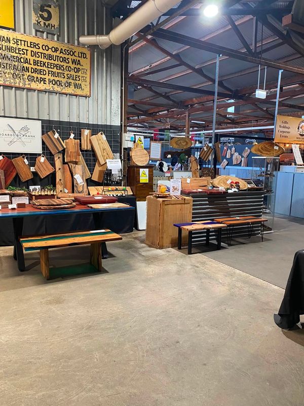 Full stall at Swan Settlers Markets, boards wall and banner
