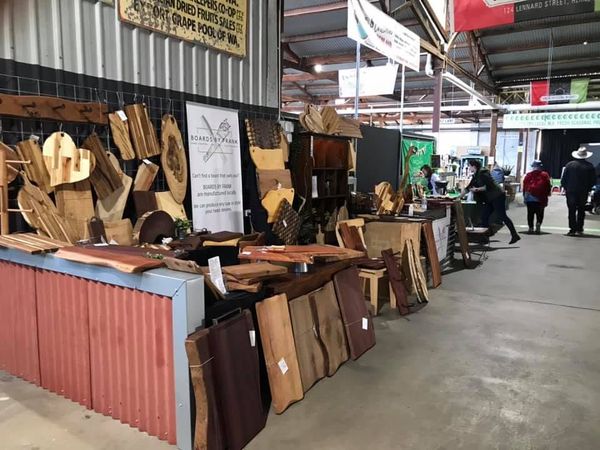 Stall front with boards and banner, market hall